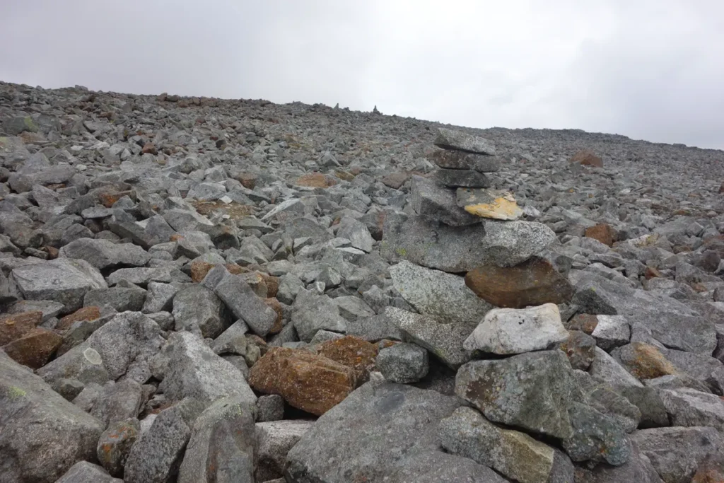 Stone cairn that can be difficult to see