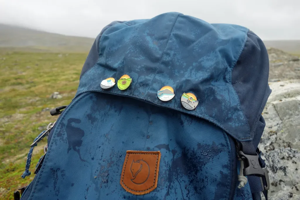 Halti pin on the backpack after a successful ascent